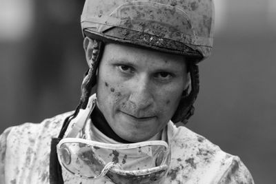 Close-up portrait of man wearing helmet