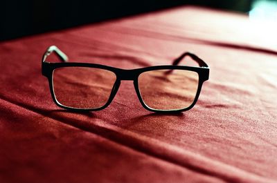 Close-up of sunglasses on table