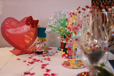 Close-up of multi colored flowers on table