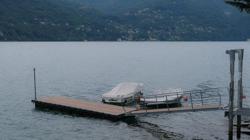 High angle view of railing by sea