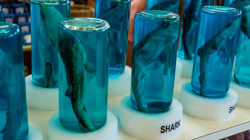 Close-up of drinking glasses on table