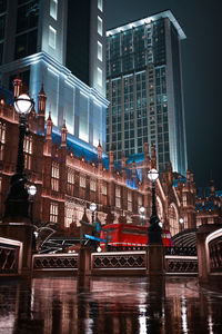 Illuminated buildings in city at night