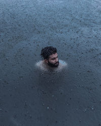 Portrait of man in water