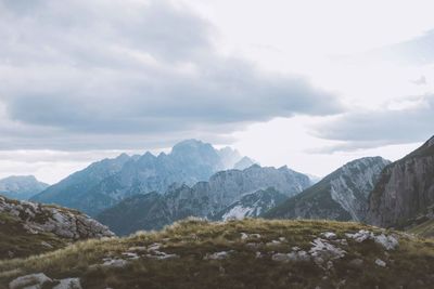 View of mountain range against cloudy sky