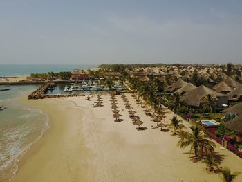 High angle view of people on beach against sky