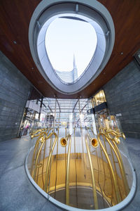 Low angle view of illuminated ceiling in building