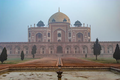 Humayun tomb exterior view at misty morning from unique perspective