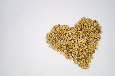 High angle view of bread against white background
