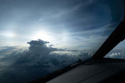 Scenic view of sky seen through car window