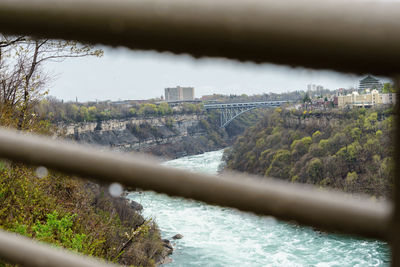 River passing through bridge