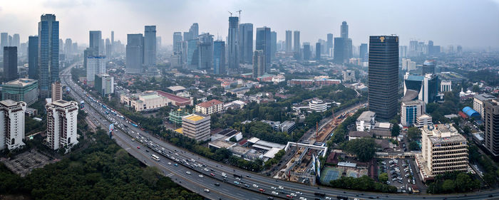 Aerial view of cityscape against sky