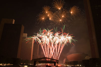 Firework display at night