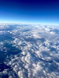Aerial view of clouds against blue sky