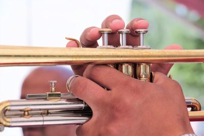 Close-up of musician playing brass instrument