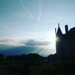 Low angle view of vapor trails in sky