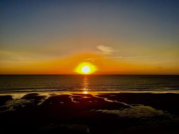 Scenic view of sea during sunset