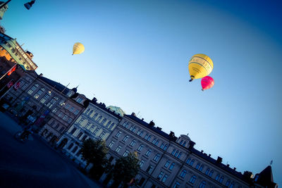 Low angle view of lanterns in city