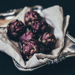 Close-up of vegetables on silver plate