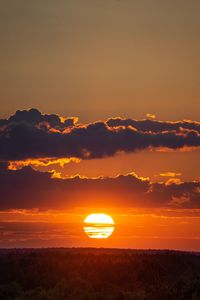 Scenic view of mountains against sky during sunset