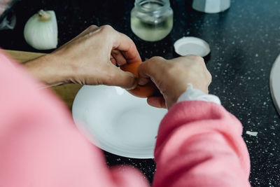 High angle view of couple holding hands