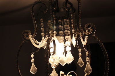 Low angle view of illuminated chandelier