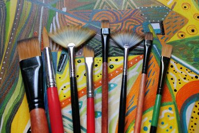 Close-up of paintbrushes on table