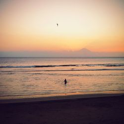 Scenic view of sea at sunset