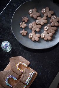 Preparing homemade gingerbread houses for christmas 2021