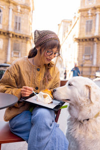 Portrait of woman with dog