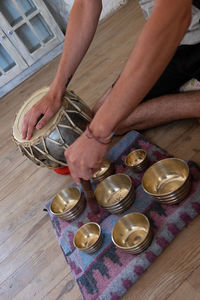 High angle view of man preparing food on table