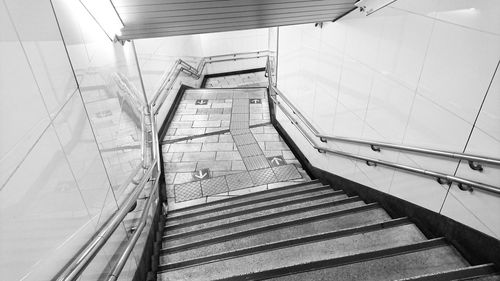 Staircase on escalator