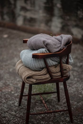 High angle view of clothing on chair 