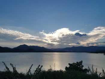 Scenic view of lake against sky during sunset