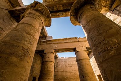 Low angle view of old temple against sky