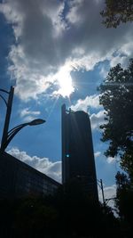 Low angle view of factory against sky