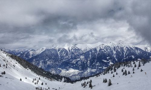 Scenic view of snowcapped mountain against sky