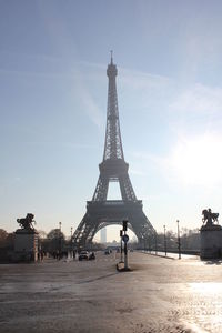 Eiffel tower against sky during sunny day