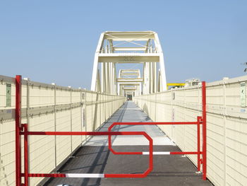 Bridge against clear sky in city