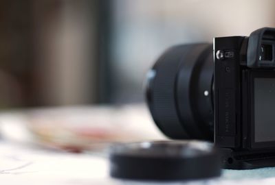 Close-up of camera on table