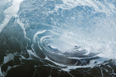 Close-up of waves splashing in sea