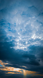 Low angle view of clouds in sky during sunset