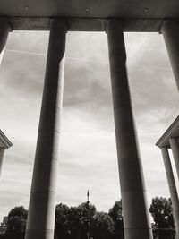 Low angle view of building against cloudy sky