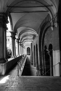 Rear view of man standing in historic building