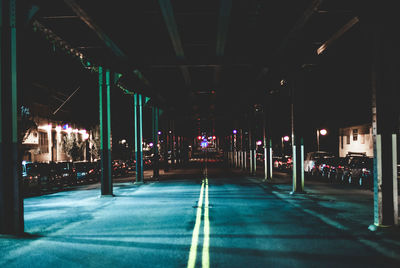 View of illuminated street at night