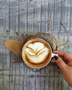 High angle view of coffee cup on table