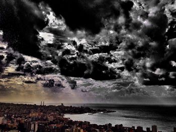 Scenic view of sea against cloudy sky