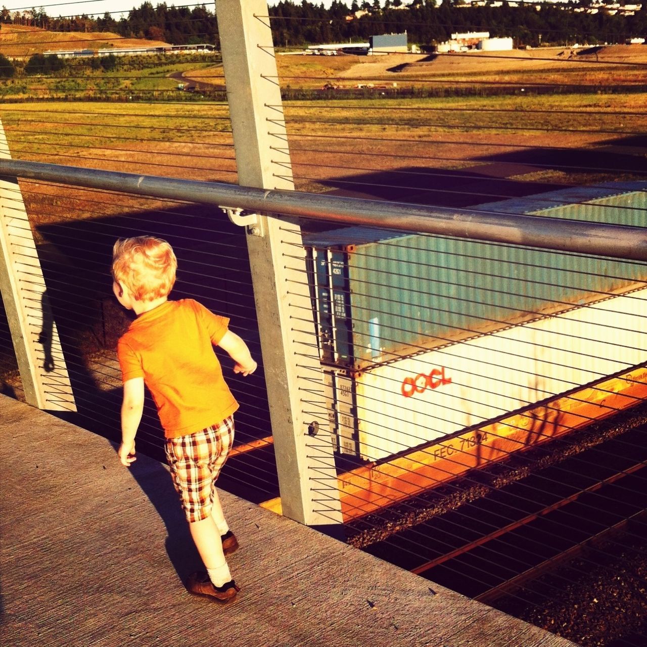 full length, lifestyles, casual clothing, leisure activity, childhood, elementary age, person, girls, standing, boys, railing, built structure, architecture, rear view, steps, indoors, three quarter length, innocence