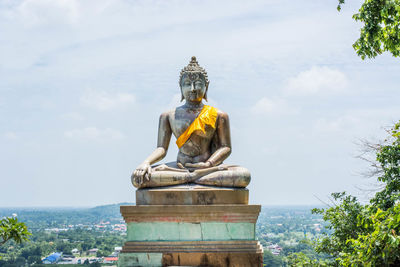 Low angle view of statue against sky