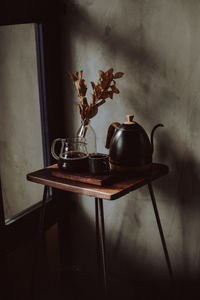 Flower vase on table at home