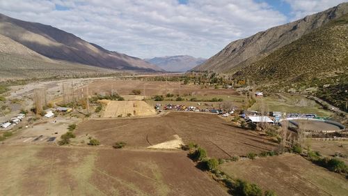 Scenic view of agricultural landscape against sky